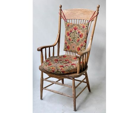 ARMCHAIR, early 20th century ash oak and elm possibly American spindle back and shaped seat with kilim print cushions 58cm. 