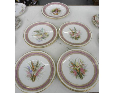 AN EARLY ROYAL WORCESTER SEVEN PIECE 'JEWELLED' DESSERT SERVICE, PAINTED WITH WILD FLOWERS AND HEATHERS IN PINK BORDER, IMPRE