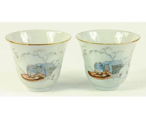 A PAIR OF CHINESE PORCELAIN BELL SHAPED CUPS, PAINTED WITH A MAN ON A RAFT, DAOGUANG MARK AND POSSIBLY OF THE PERIOD