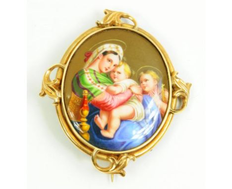 A VICTORIAN GOLD BROOCH, MID 19TH C   set with a Swiss enamel, the oval medallion finely painted after Raphael with the Madon