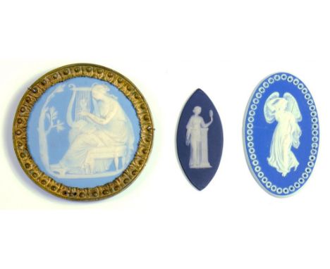 THREE WEDGWOOD MEDALLIONS, COMPRISING AN OVAL BLUE JASPER DIP EXAMPLE WITH PIERCED BORDER, C1780 (RESTORED), A BLACK JASPER D