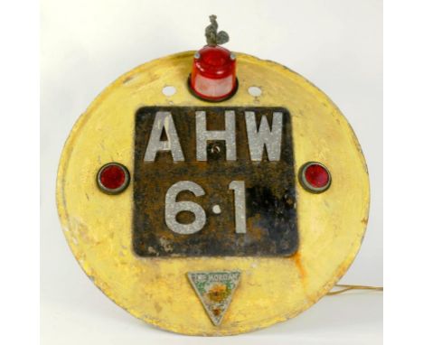 VINTAGE MOTORING.  A PAINTED METAL MOUNTED NUMBER PLATE 'A.H.W. 61' AND TRIANGULAR BADGE OF THE MORGAN THREE WHEELER CLUB