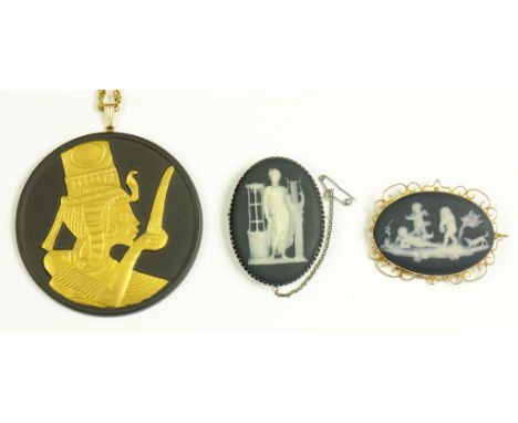A WEDGWOOD BLACK JASPER WARE CAMEO SET IN A GOLD BROOCH-PENDANT, IMPRESSED MARK, MOUNT MARKED 9C, LATE 19TH C, ANOTHER SET IN