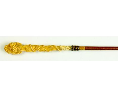 A VICTORIAN HORSEHAIR RIDING WHIP, THE IVORY HANDLE CARVED IN THE FORM OF A FRUITING VINE, SILVER GILT FERRULE