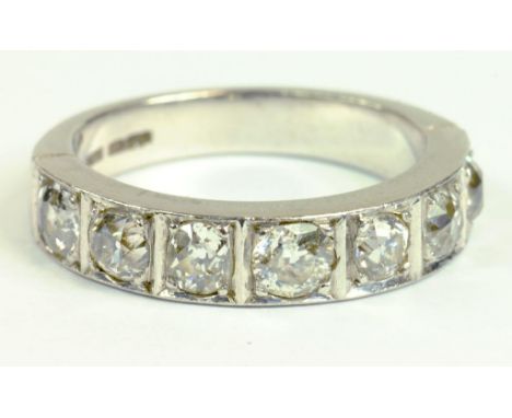 A DIAMOND SEVEN STONE RING, WITH SQUARE SET OLD CUT DIAMONDS IN PLATINUM, 7.7G