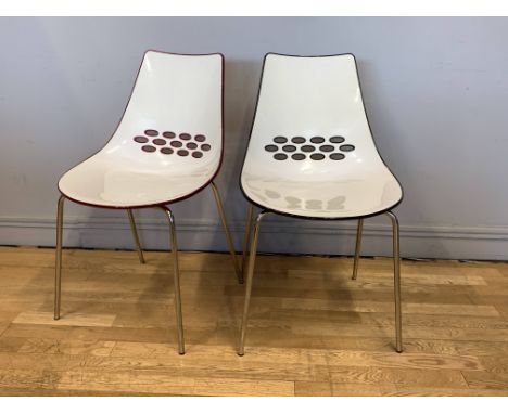 Two Calligaris Jam Sled base dining chairs, made in Italy, two tone plastic seat, one in black, one in pink