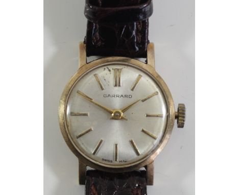 Garrard, a 9ct gold manual wind ladies wristwatch, London 1969, 17 jewel movement, 20mm, together with a receipt dated 1991 f