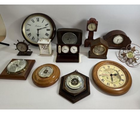 An 8 day inlaid mahogany mantle clock made in France together with a 1920's Chinoiserie example, and a selection of barometer