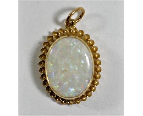 A 9ct gold mounted opal pendant, 16 x 12mm, 1.3gm 