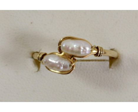 A 14K gold and rice pearl ring, Q, 1.3gm 