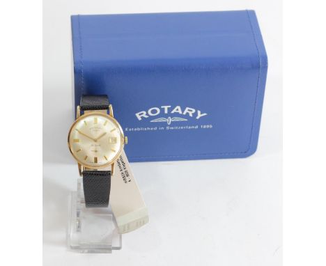 Rotary, a 9ct gold manual wing date wristwatch, London 1965, with 17 jewel movement Hirsch lizard strap, case.The watch sets 