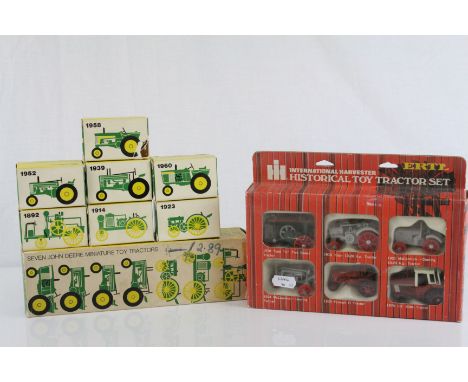 ERTL boxed set of Seven John Deere Miniature Toy Tractors, all seven tractors within original boxes, diecast vg, outer box fa