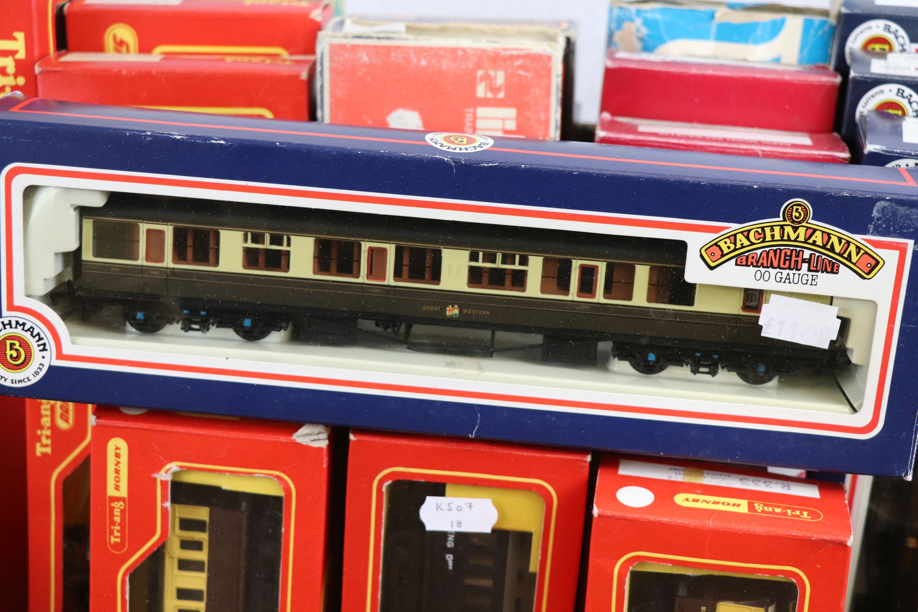 35 Boxed items of OO gauge model railway rolling stock featuring