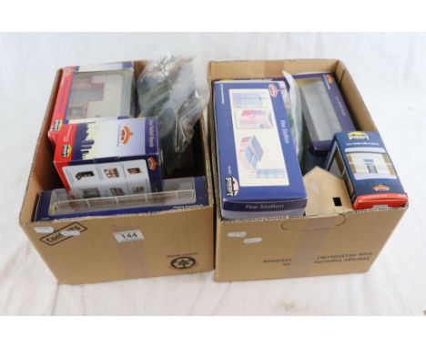 Eight boxed Bachmann Scenecraft trackside accessories to include Low Relief Office Block, Fire Station, Corner Shop x 2, Low 
