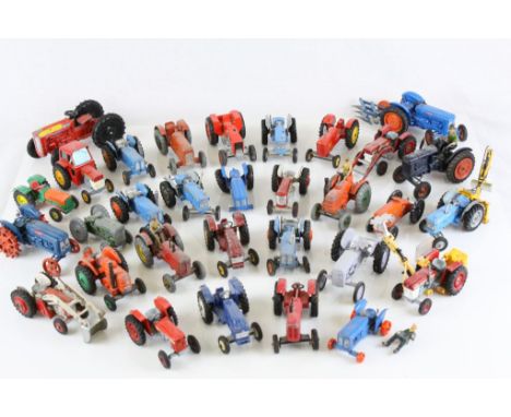 Collection of vintage diecast model tractors in vg to fair play worn condition to include Dinky and Matchbox Lesney, approxim