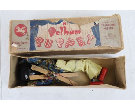 Boxed Pelham Puppet Golly in a good play worn condition