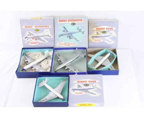 Four boxed Dinky Supertoys diecast model planes to include 999 DH Comet Airliner, 702 DH Comet Airliner, 998 Bristol Britanni