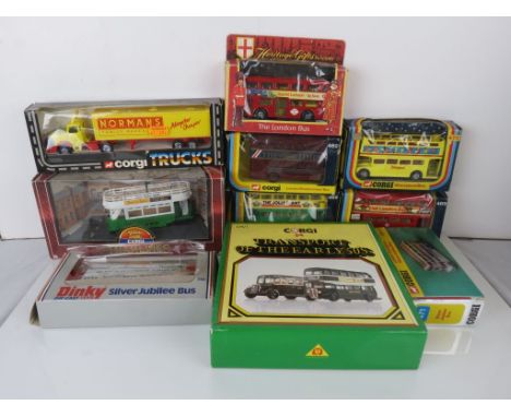 Ten boxed diecast models to include Corgi buses 469 (3), 470, 471, Dinky 297 Bus, Matchbox London Bus, Corgi Tramlines, Corgi