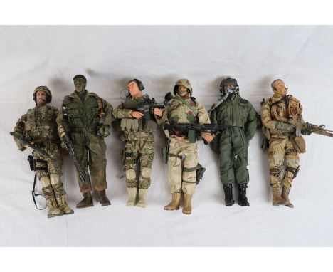 A collection of six very detailed military 1/6th scale action figures, all in full uniform with weapons and accessories. 