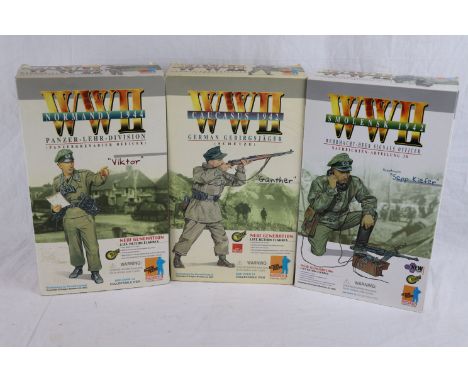 Three WW2 Dragon 1/6th scale action figures to include German Gebirgsjager Gunther, Panzer-Lehr-Division Panzergrenadier Offi