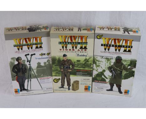 Three WW2 Dragon 1/6th scale action figures to include U.S. Army 630th Tank Destroyer Battalion Private Roscoe, Tiger Ace Unt