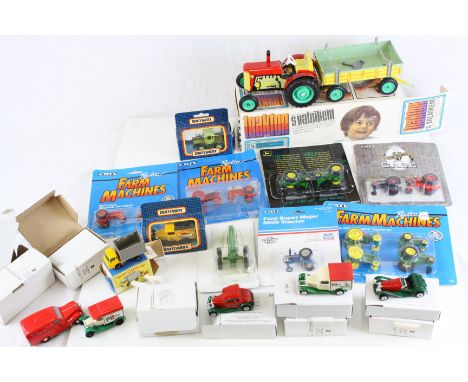 15 Boxed/carded model vehicles to include ERTL, Matchbox and Czechoslavakia tin plate tractor and trailer