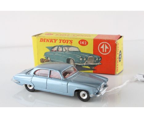 Boxed Dinky 142 Jaguar Mark X in metallic blue with chrome hubs and red interior, with suitcase, vg with gd box showing stora