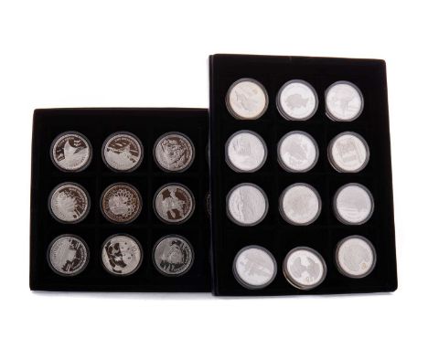 COLLECTION OF SILVER COINS,each weighing one ounce, comprising twenty four coins, each in capsules