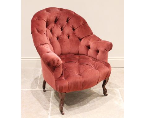 A Victorian button back tub chair, upholstered in red velour, the arched padded back and arms, enclosing the serpentine seat,