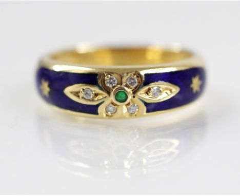 A Victor Mayer for Faberge limited edition emerald, diamond and enamel 18ct gold ring, the central floral design set with a m