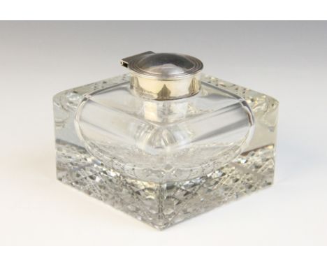 An Edwardian cut glass silver mounted inkwell, Henry Matthews, Birmingham 1901, the square form body with hobnail decoration 