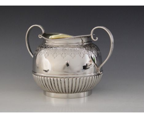 A Victorian silver twin-handled sucrier, Arthur Priestley &amp; Co, Sheffield 1894, of globular form with scrolling handles o