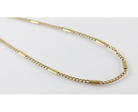 A gold coloured chain, comprising alternating curb links an plain polished links, lobster claw and loop fastening, jump rings