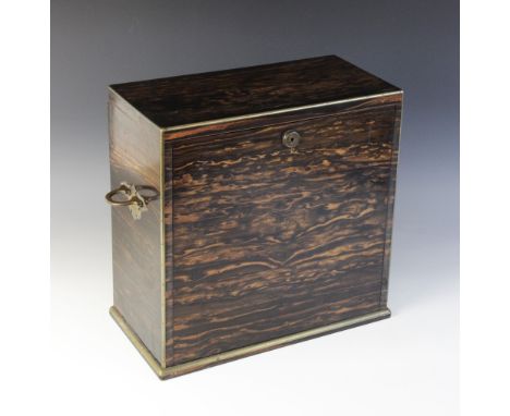 A Victorian coromandel stationery box, stamped Edwards & Jones, Regent St, London, to the lock, the hinged top and fall front