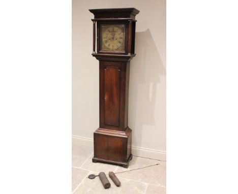 A George III oak cased eight day longcase clock by Thomas of Whitchurch, the hood with a blind fretwork frieze over freestand