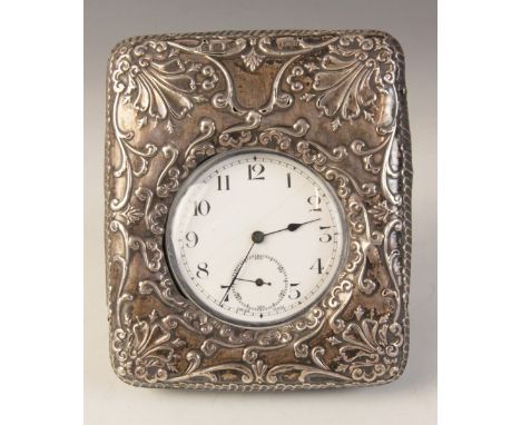 An Edwardian silver mounted pocket watch stand, Henry Williamson Ltd, Birmingham 1909, of rectangular form, the cover with em