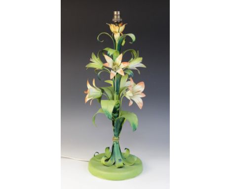 A vintage French toleware floral lamp base, mid-20th century, the stem designed as tiger lilies and scrolling leaves upon a g