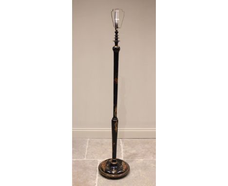 An early 20th century Chinoiserie decorated standard lamp, the bobbin turned and tapering column extending to a circular plin