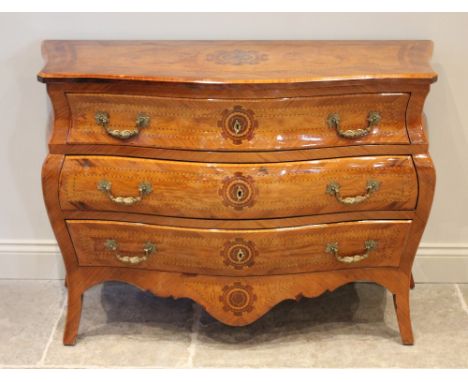 A Louis XV kingwood and marquetry bombe commode chest, late 20th century, the lacquered serpentine top inset with a burr pane
