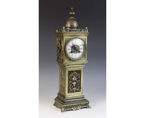 A late 19th early/early 20th century brass cased clock tower mantel clock, the case of architectural form applied with lion m