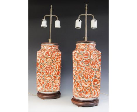 A pair of silver lustre orange lustre lamp bases, each of rectangular form upon wooden bases with electrical fittings, each 6