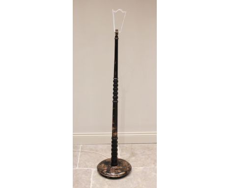An early 20th century Chinoiserie decorated standard lamp, the bulbous and tapering column applied with foliate gilt detail, 