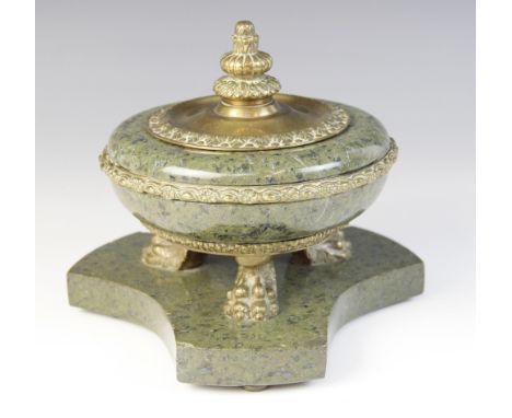 An Art Deco verte marble and gilt metal inkwell, early 20th century, the body of compressed inverted baluster form with conti