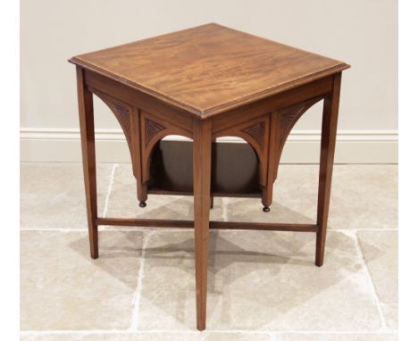 A late 19th century Aesthetic Movement mahogany occasional table, the square moulded top above bat wing moulded spandrels ext