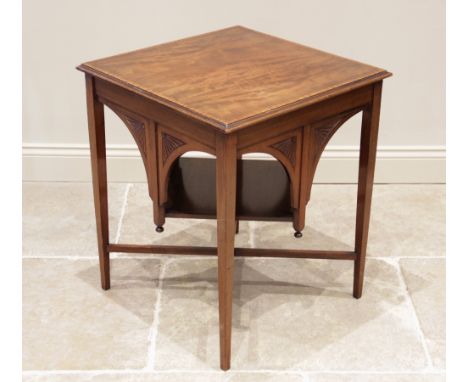 A late 19th century Aesthetic Movement mahogany occasional table, the square moulded top above bat wing moulded spandrels ext