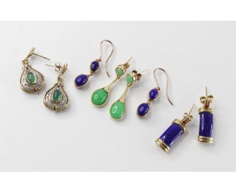 A pair of emerald and diamond 9ct gold drop earrings, each comprising an emerald cabochon within a tear shaped surround set w