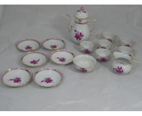 A Herend of Hungary tea set comprising of a teapot, six cups and saucers, a sugar bowl and milk jug -