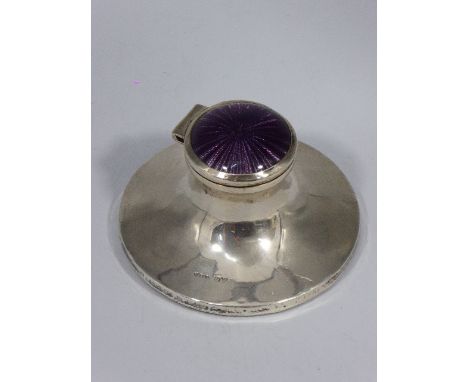 A silver inkwell with purple guilloche enamel lid, hallmarked Chester, 1912, glass liner, D.10cm