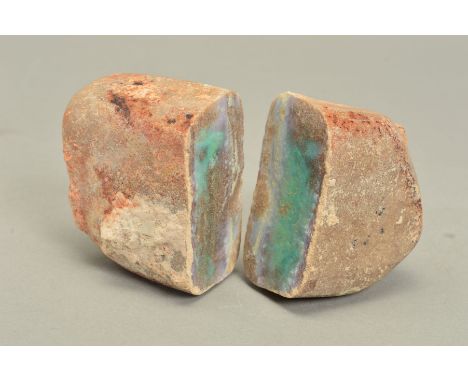 A ROUGH PIECE OF BOULDER OPAL, large stone split in two, showing flashes of greens, blue and red colours, pieces measuring ap