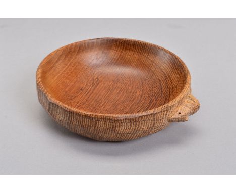 ROBERT THOMPSON OF KILBURN MOUSEMAN OAK NUT BOWL, with carved mouse detail to the adzed exterior of the bowl, diameter 15.5cm